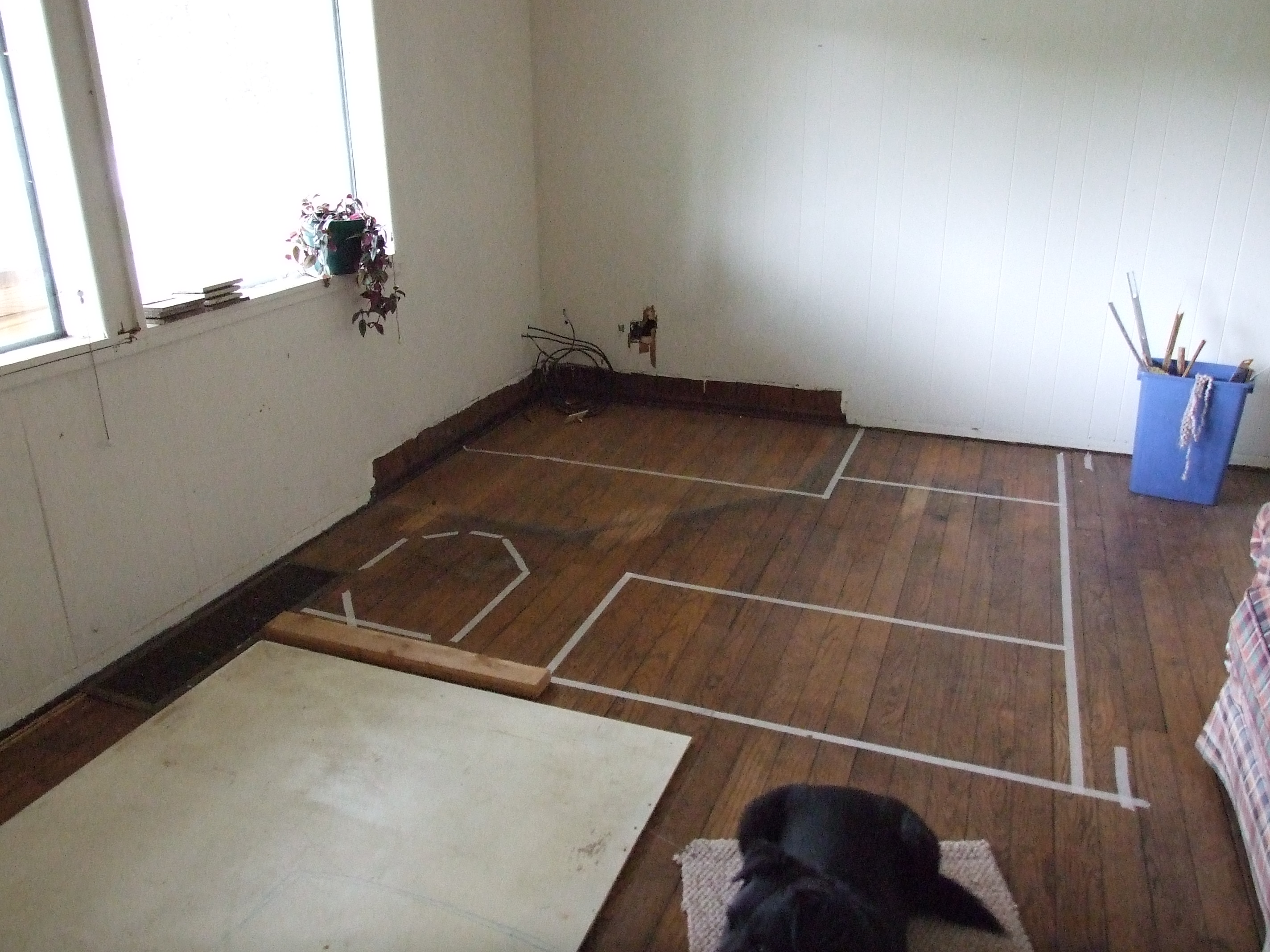 Masking tap to mark out the new bathroom location